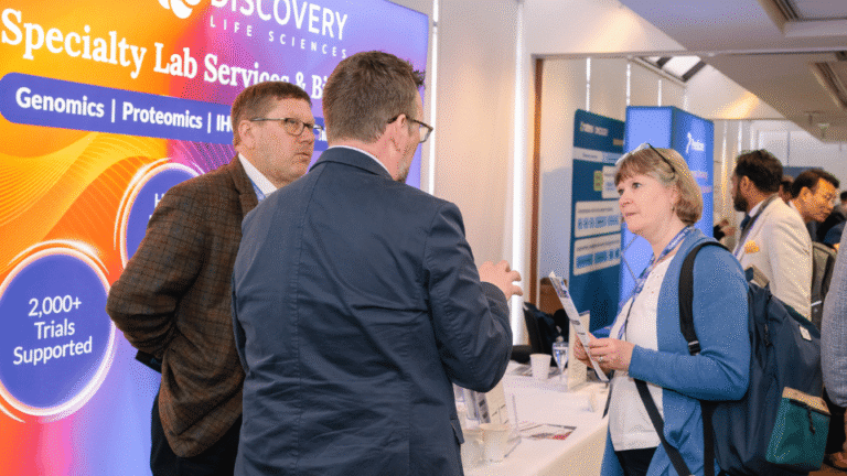 Conference attendees speaking during a professional networking session