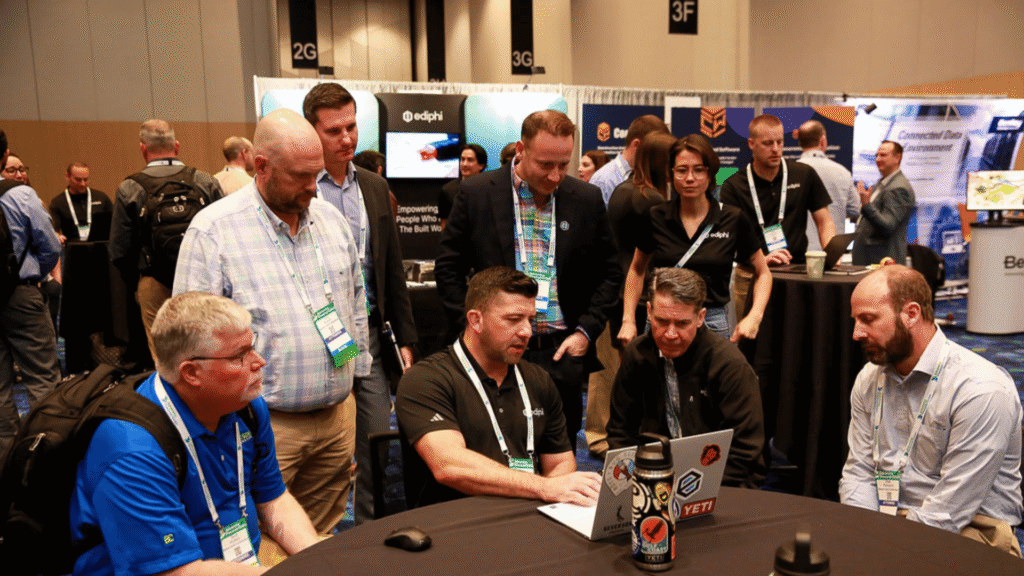 Attendees taking part in a roundtable networking session at a professional industry conference