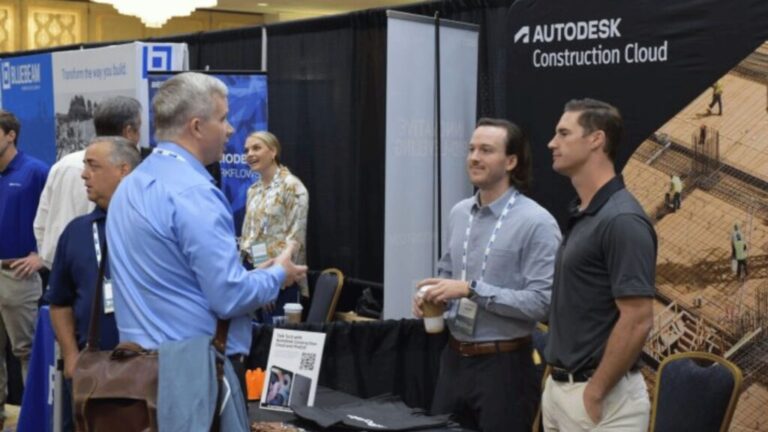 Conference attendees speaking during a professional networking session